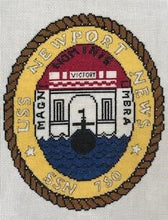Finished project USS Newport News insignia  cross stitched by Debbie K. She stitched it on 14 count aida using 2 strands of floss.