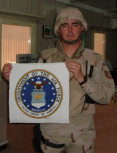 Richard B with the finished emblem that he stitched (cross stitch pattern of the US Air Force Emblem adapted to cross stitch by Sherry from Military XStitch Com